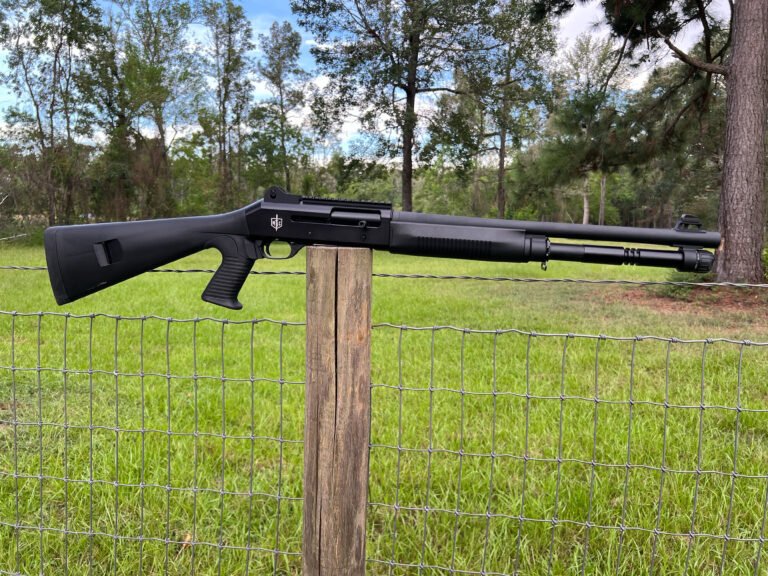 MAC 1014 on a fence post.