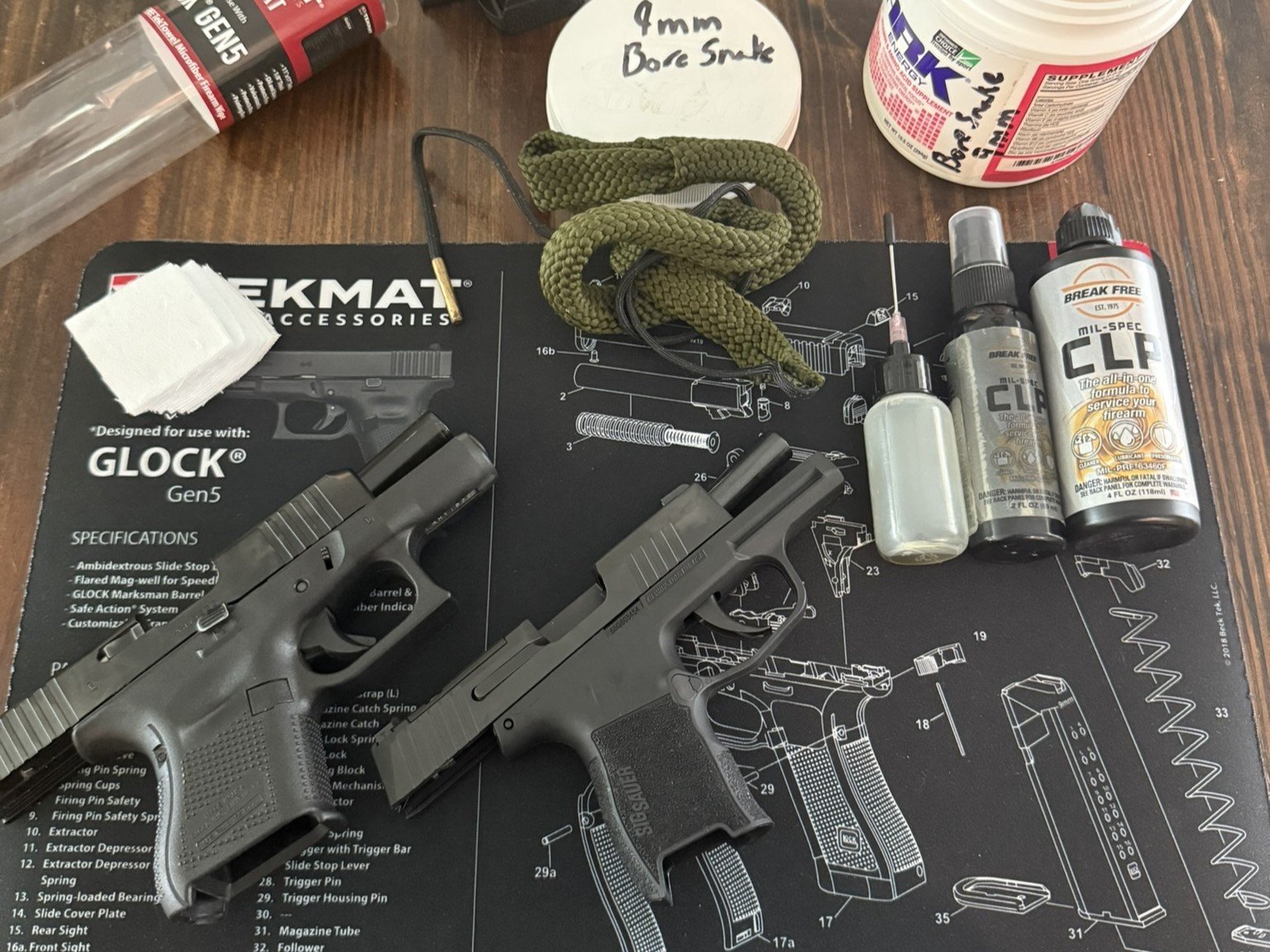 Pistols and supplies for cleaning.