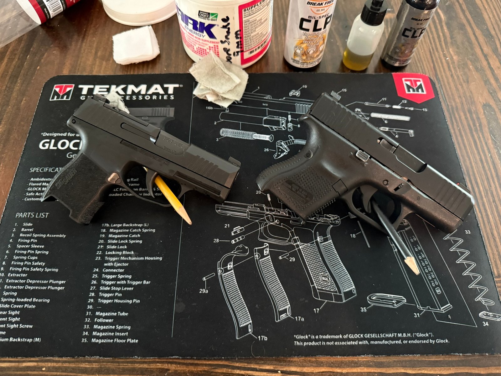 Pistols on a cleaning mat