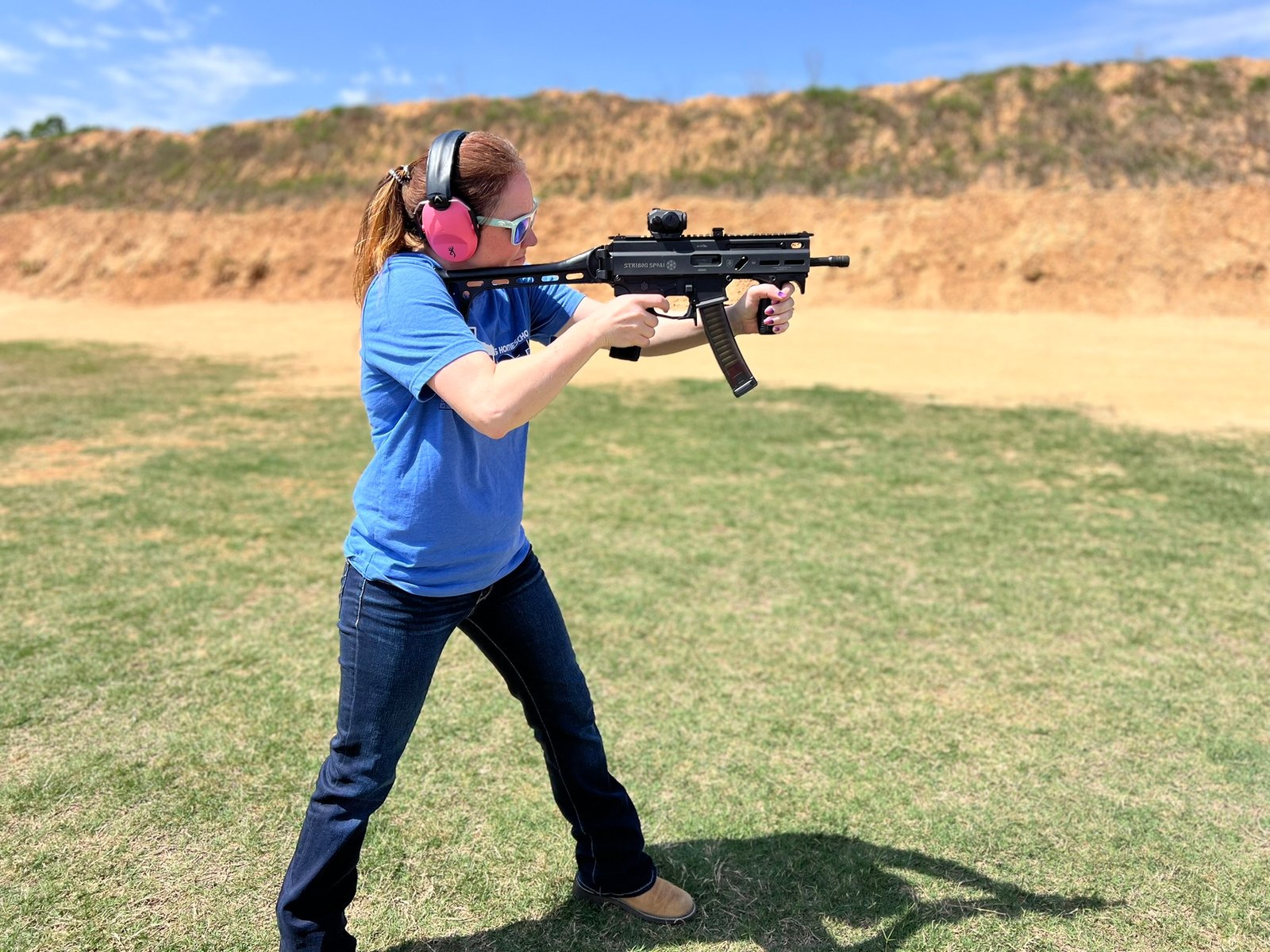 Student shooting pistol caliber carbine during training