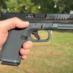 Ruger RXM 9mm pistol with Magpul EHG grip and optics-ready slide.