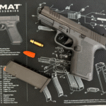 Photo of Ruger RXM with dry-fire equipment.