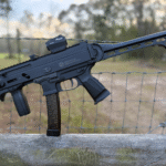 Grand Power SP9A1 on a fence rail.