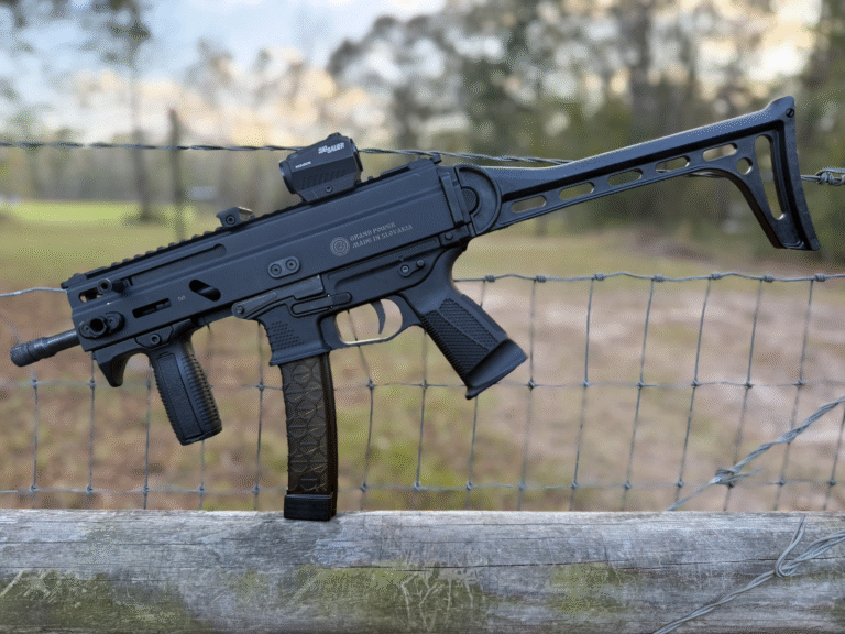 Grand Power SP9A1 on a fence rail.