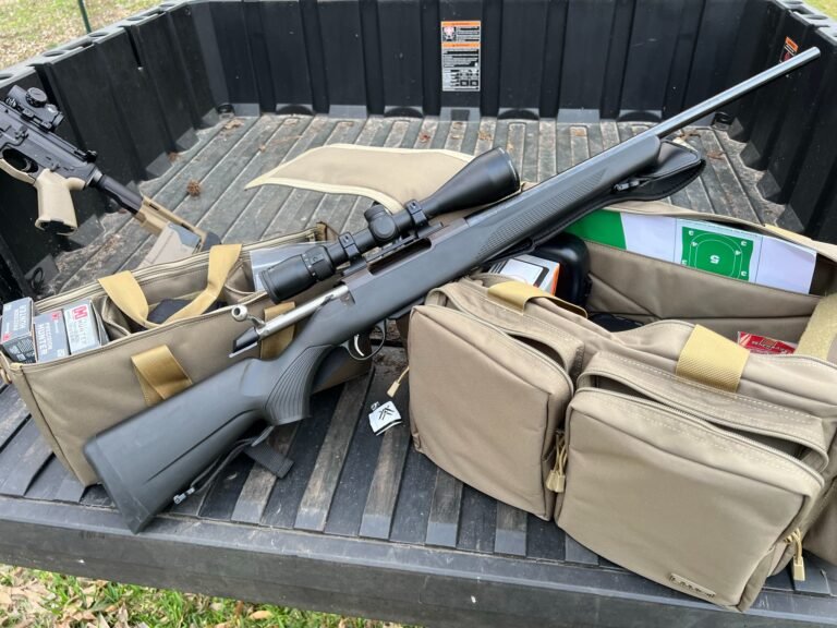 Collection of firearms gear and firearms.
