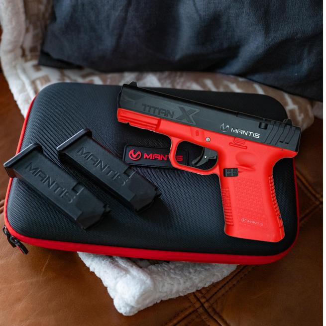 Mantis TitanX laser training pistol with magazines and carrying case used for dry fire training system