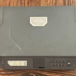 XEGIS biometric gun safe closed showing palm vein scanner, keypad entry system, and digital humidity and temperature display for quick-access handgun storage.