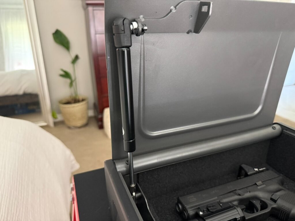 Hornady Rapid Safe Keypad Vault gas strut lid support showing internal lifting mechanism and build quality