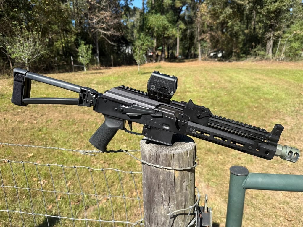 Full side view of PSA AK-V pistol-caliber carbine equipped with an Osight R red dot sight