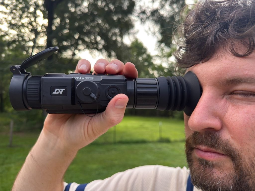 DNT Hydra HS635R being used as a handheld thermal monocular outdoors